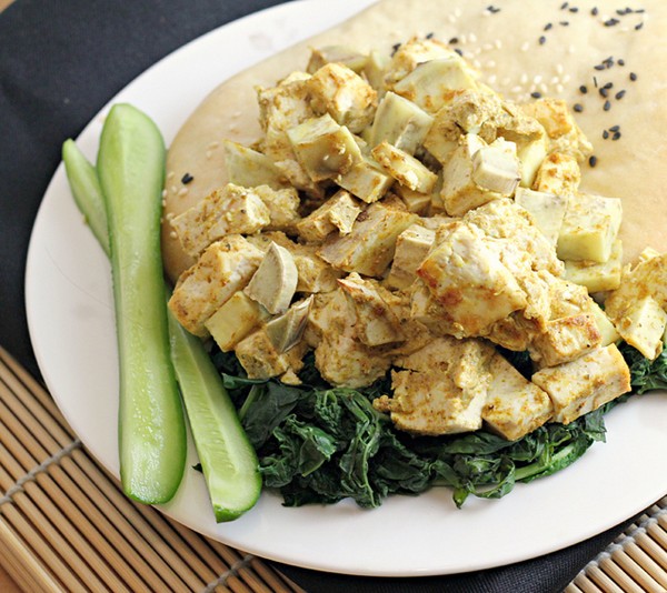Tofu and sweet potato shawarma on sesame flatbreads with homemade pickles