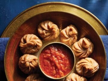 Tofu and vegetable momos with tomato chutney