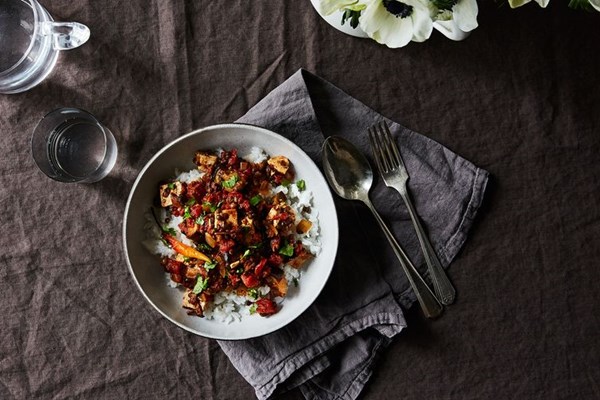 Tofu, aubergine, and beluga lentils with pomegranate molasses