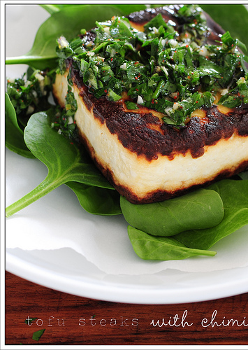Tofu steaks with chimichurri & baby spinach