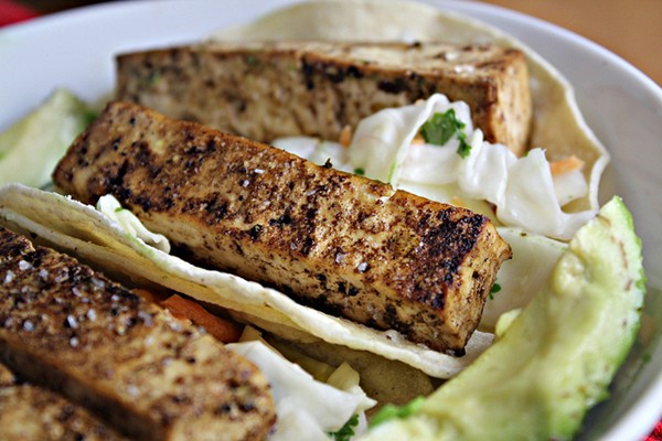 Tofu tacos with spicy cabbage slaw and avocado