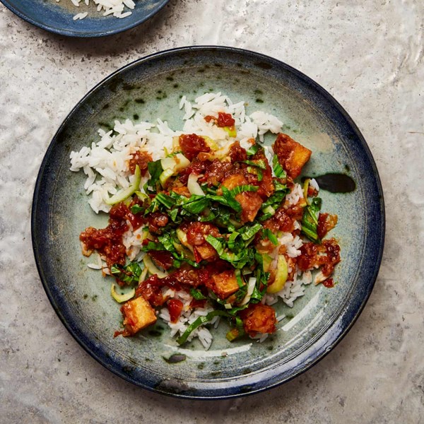 Tofu with tomatoes, sweet soy and greens