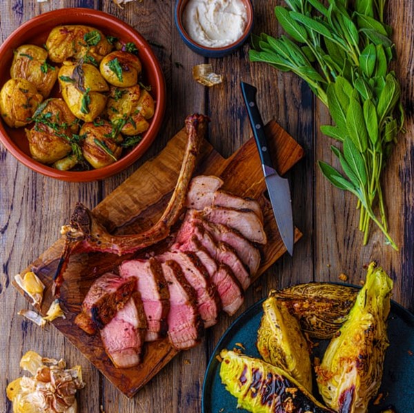Tomahawk pork, roast garlic puree, hispi cabbage with dried shrimp butter, crushed new potatoes with sage and crispy onions