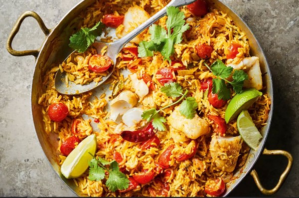Tomato & coconut pilau with steamed white fish