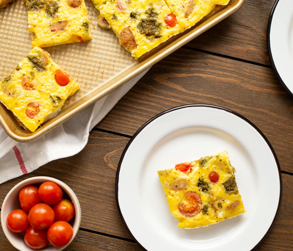 Tomato & pesto sheet pan eggs
