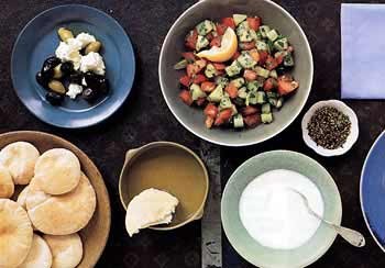 Tomato and cucumber salad with bread and za'atar