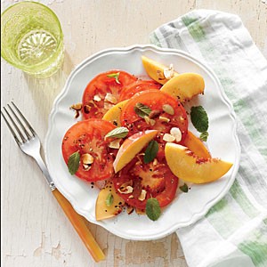 Tomato and peach salad with almonds