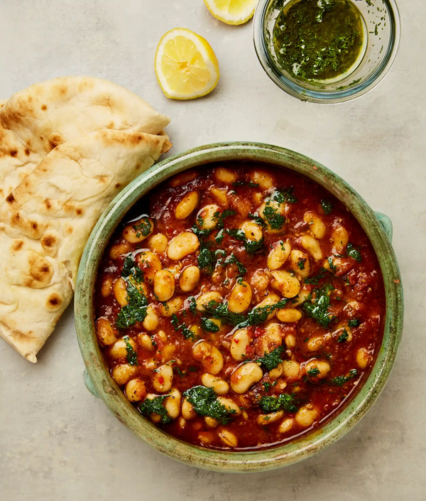Tomato and rose harissa butter beans