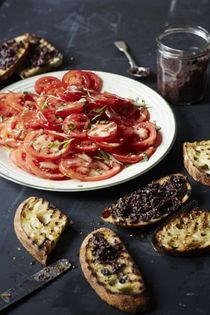 Tomato and tarragon salad with tapenade toast
