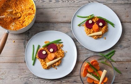 Tomato and vegetable risotto faces