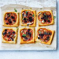 Tomato, black olive and ricotta puff tarts
