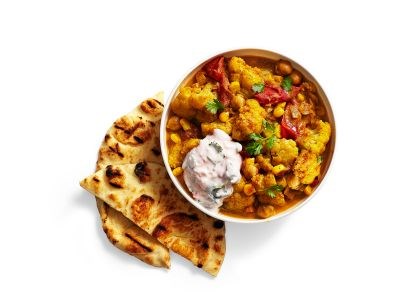 Tomato-cauliflower curry with corn