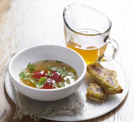 Tomato consommé with cheese on toast