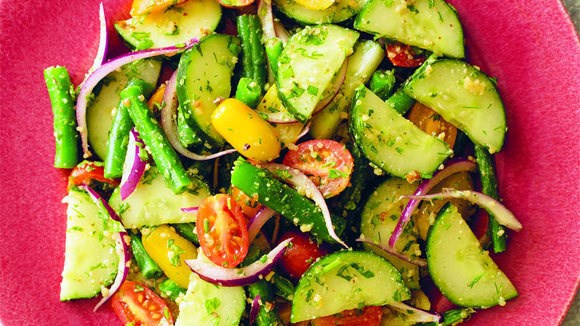 Tomato, cucumber, and green bean salad with walnut dressing