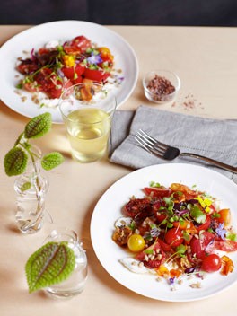 Tomato, fried wheat and goat's curd salad
