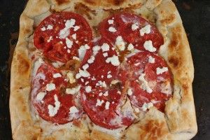 Tomato galette with goat cheese, caramelized onions, and bacon