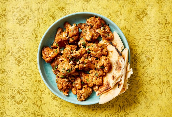 Tomato-ginger braised cauliflower
