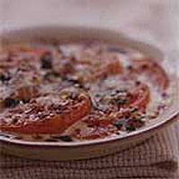 Tomato gratin with cream and basil