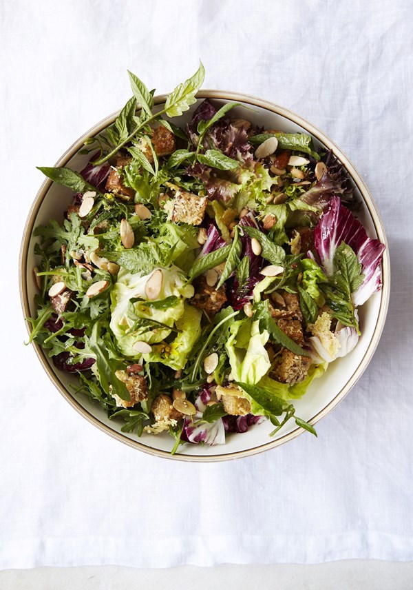 Tomato leaf, arugula, and other mixed greens salad