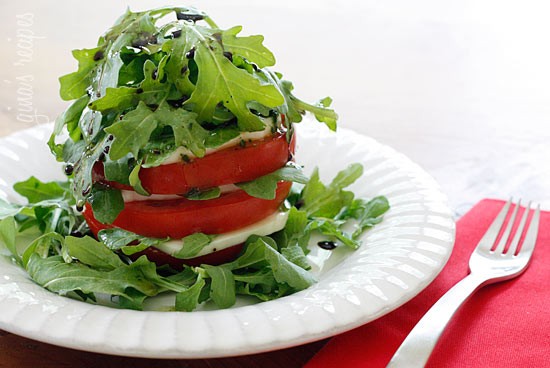 Tomato mozzarella and arugula tower