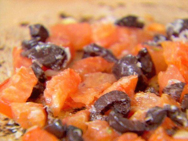 Tomato, olive and Parmesan pizza