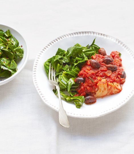 Tomato, olive and rosemary cod with stir-fried greens