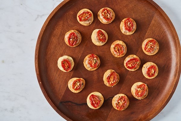 Tomato, olive tapenade and rosemary canapés