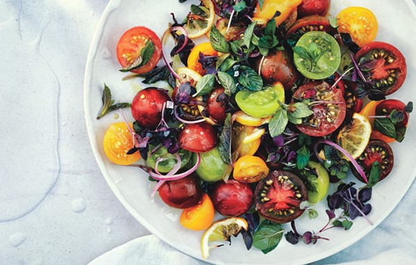 Tomato, onion, and roasted lemon salad