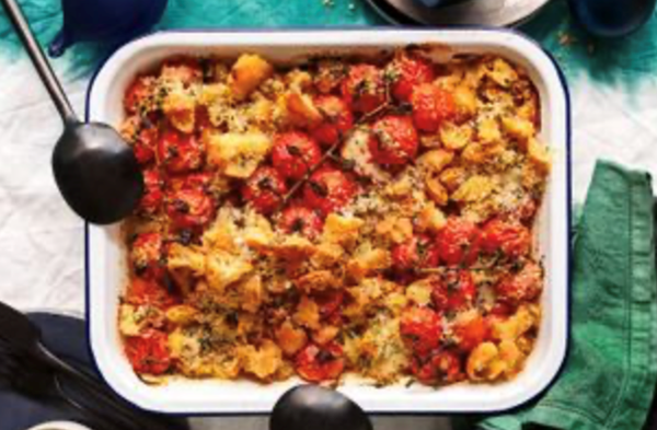 Tomato, Parmesan and caramelised garlic gratin with salsa verde