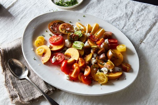 Tomato, peach, chèvre, and herb salad with apple vinaigrette