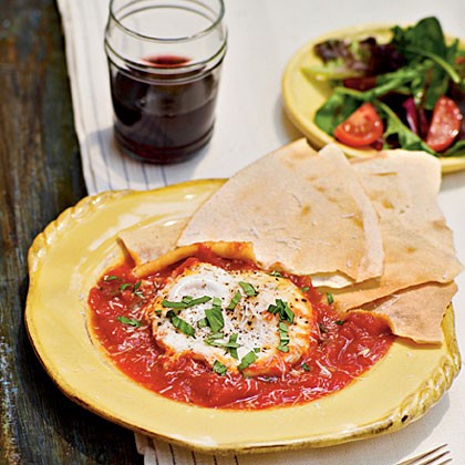 Tomato-poached eggs with Sardinian music bread (Ovos kin tomate e casu)