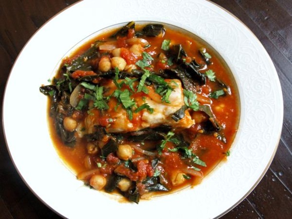 Tomato-poached fish with kale and chickpeas
