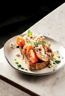 Tomato salad and tapenade on toasted sourdough