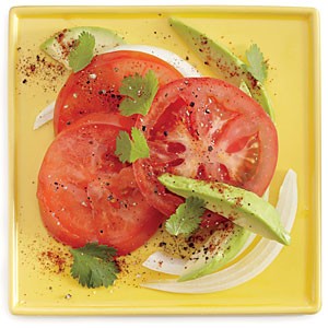 Tomato salad with avocado and onion