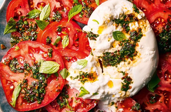 Tomato salad with chilli oil, Thai basil & burrata