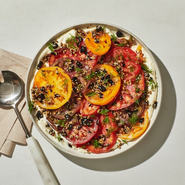 Tomato salad with crème fraîche and olive granola