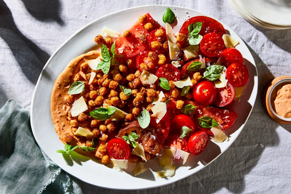 Tomato salad with crispy spiced chickpeas