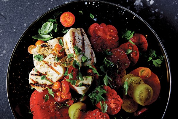 Tomato salad with grilled halloumi and herbs
