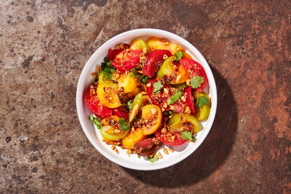 Tomato salad with peanuts, cilantro and chipotle-sesame dressing