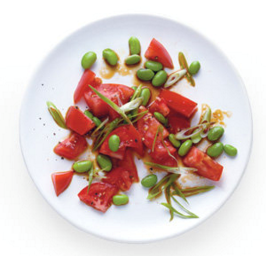 Tomato salad with soy sauce, scallions, and edamame