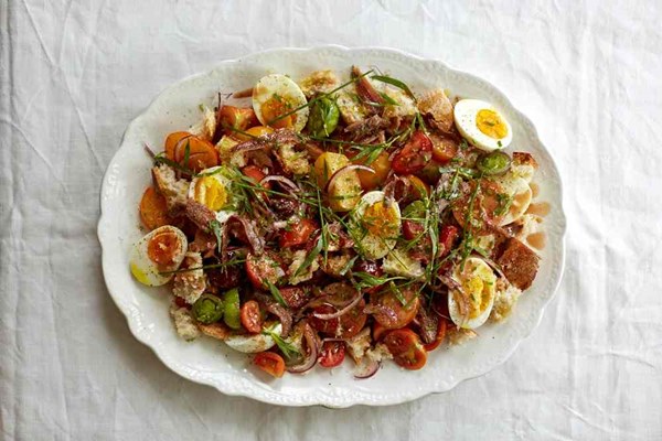 Tomato salad with tarragon, chives, eggs and anchovies