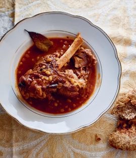 Tomato soup with barley and lamb shanks (Shorbat ameh)