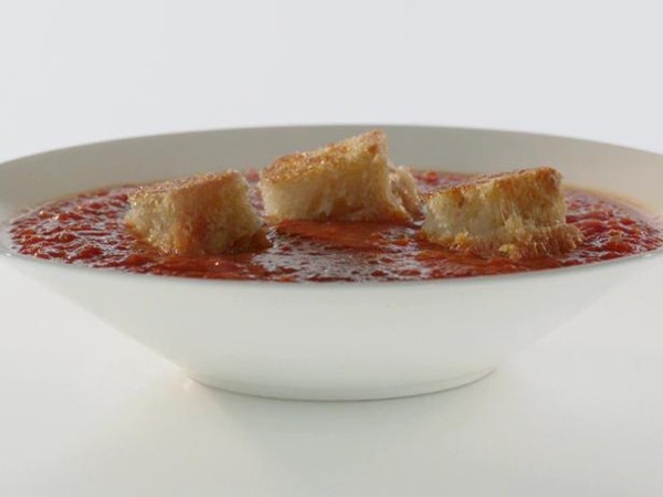 Tomato soup with roasted peppers, garlic & onions with Gruyère croutons