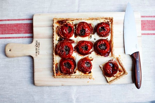 Tomato tart with goat cheese, quark, prosciutto, and gremolata
