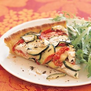 Tomato-zucchini tart with goat cheese