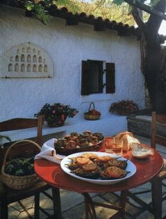 Tomatoes and peppers stuffed with trahana (Gemista me trahana)