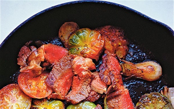 Tomatoes, charred onions and steak