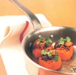 Tomatoes stuffed with chicken, mint, peanuts and coriander
