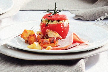 Tomatoes stuffed with roast vegetable couscous