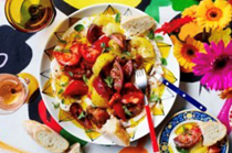 Tomatoes with stracciatella and oregano